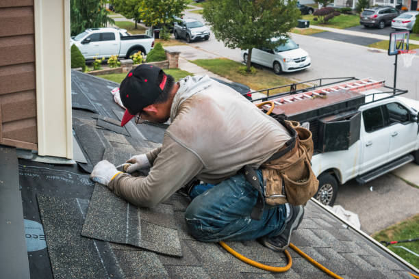 Professional Gutter Repair And Installation technician working in Keene, NY